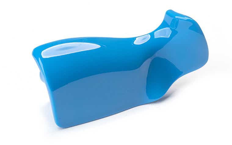 A shiny mass-blue handle made with ABS-like Polyurethanes using vacuum casting.
