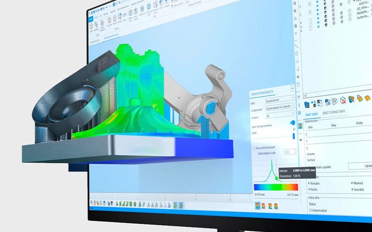 3D design coming out of a computer screen with the Magics software on it