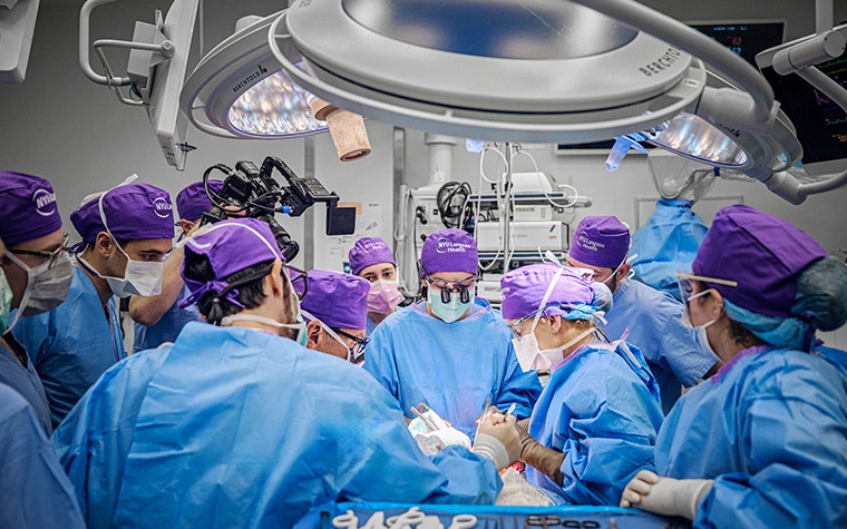 The full surgical team in the operating room in NYU Langone during the whole-eye transplant surgery