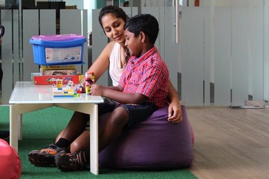 Padmaloshn playing legos with Ayishwariya
