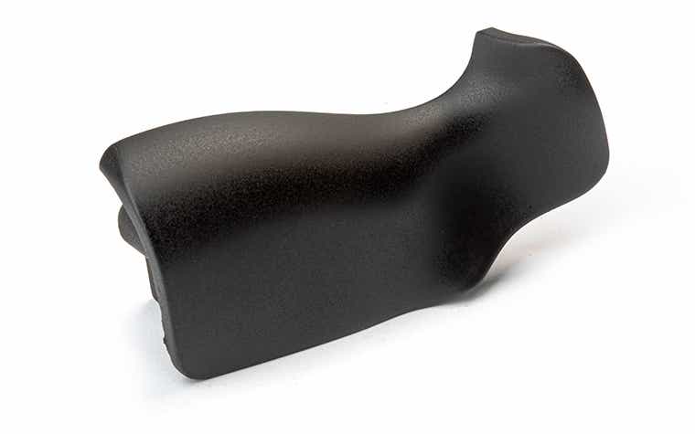 Un mango negro fabricado con poliuretanos tipo ABS mediante fundición al vacío, acabado con imprimación y pintura mate con un 10% de brillo.