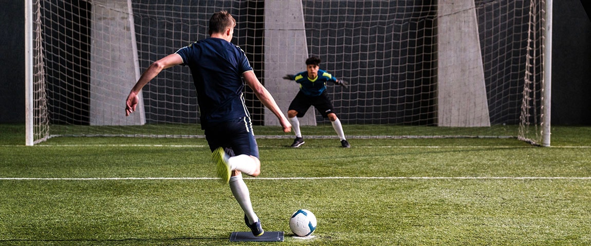 A player taking a penalty while using our footscan technology