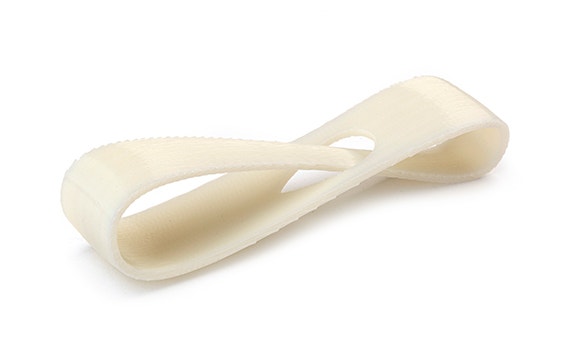 A white 3D-printed loop made from ABS-M30i using fused deposition modeling with a normal finish