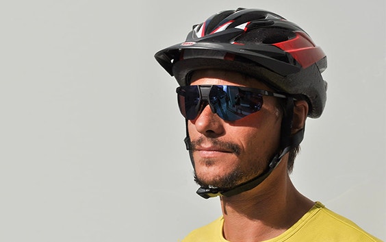 Man wearing sunglasses and a helmet