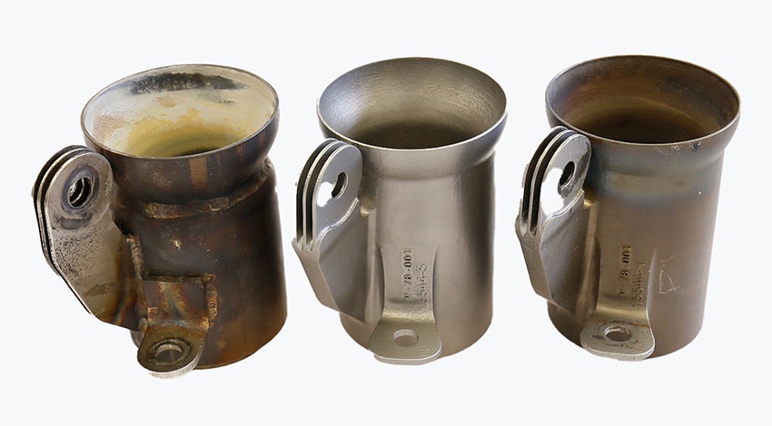 Three metal muffler couplers for powered gliders. One produced with traditional manufacturing methods, two metal 3D-printed in Inconel by Vocus.