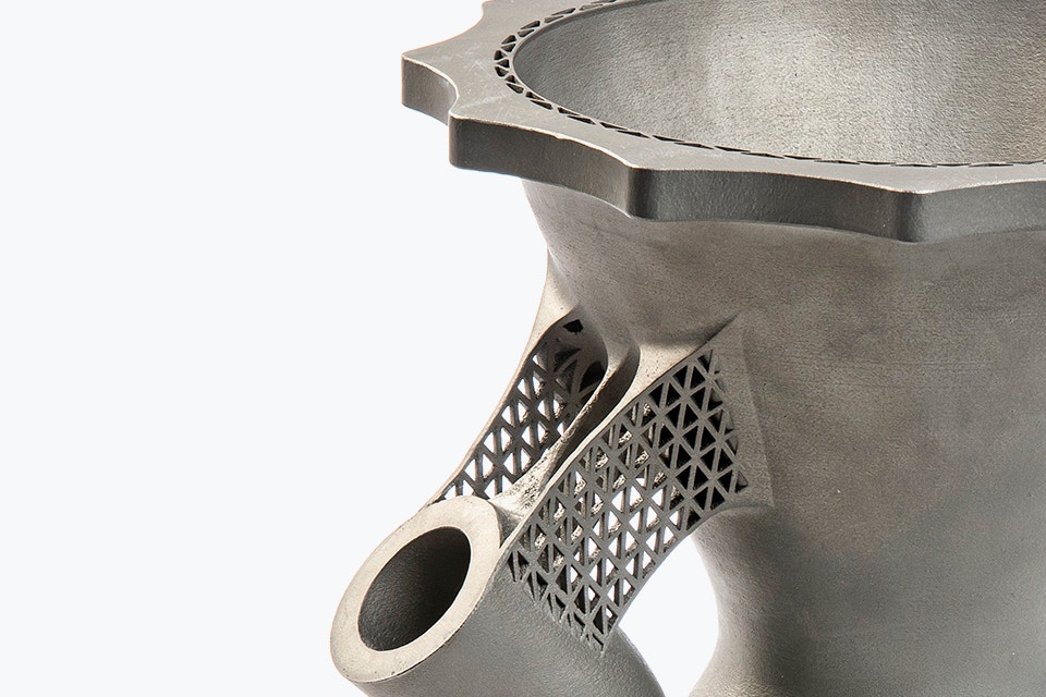 Close-up view of the top of a 3D-printed volute at the base of the Firebolt DLX-150 liquid rocket engine