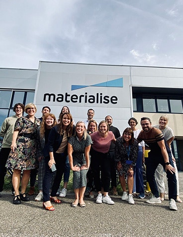 A group photo of employees at Materialise HQ in Belgium
