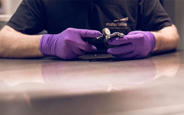production-worker-polishing-metal-part.jpg