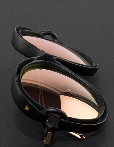 Close-up angled view of the IMPRESSIO Vortex sunglasses lenses