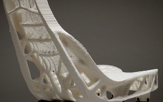Rear view of a 3D-printed car seat with lightweight structures