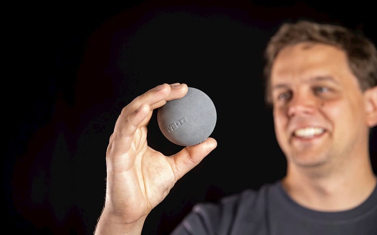 Giovanni Vleminckx, Research Project Manager at Materialise holds a sphere of TPU