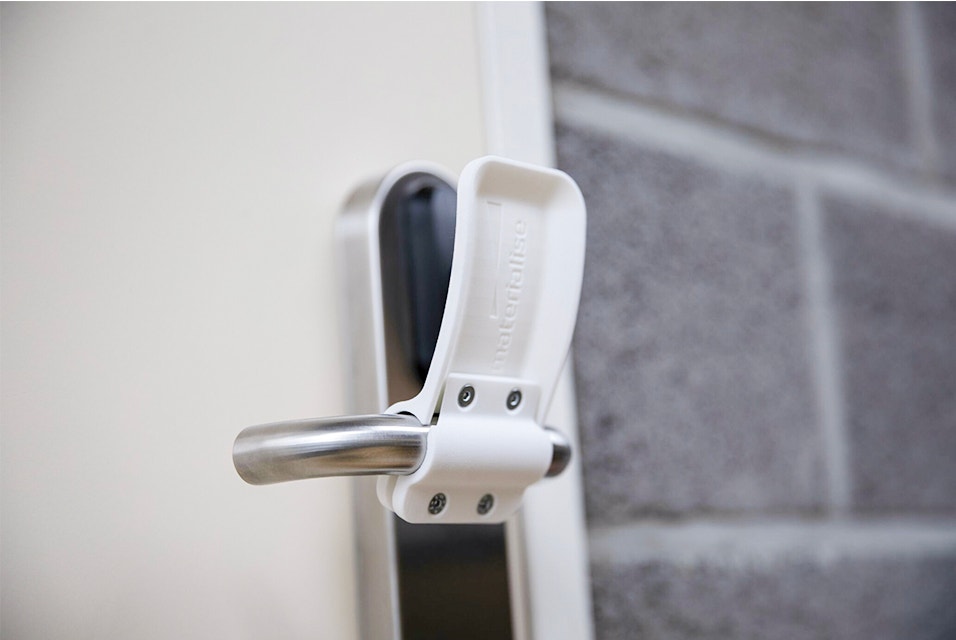 3D-printed, hands-free door opener attached to a door handle