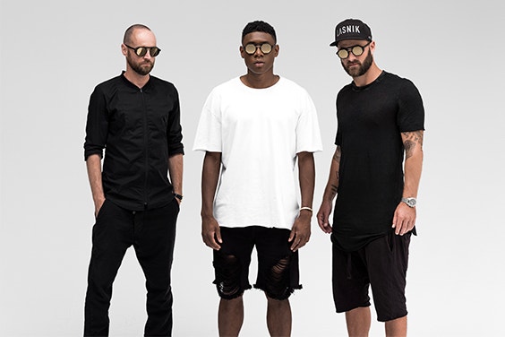 Three male models posing while wearing DA27 x Lasnik sunglasses