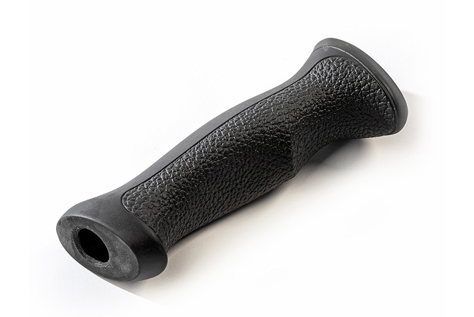 Black ski pole handle, vacuum cast in a rubber-like polyurethane