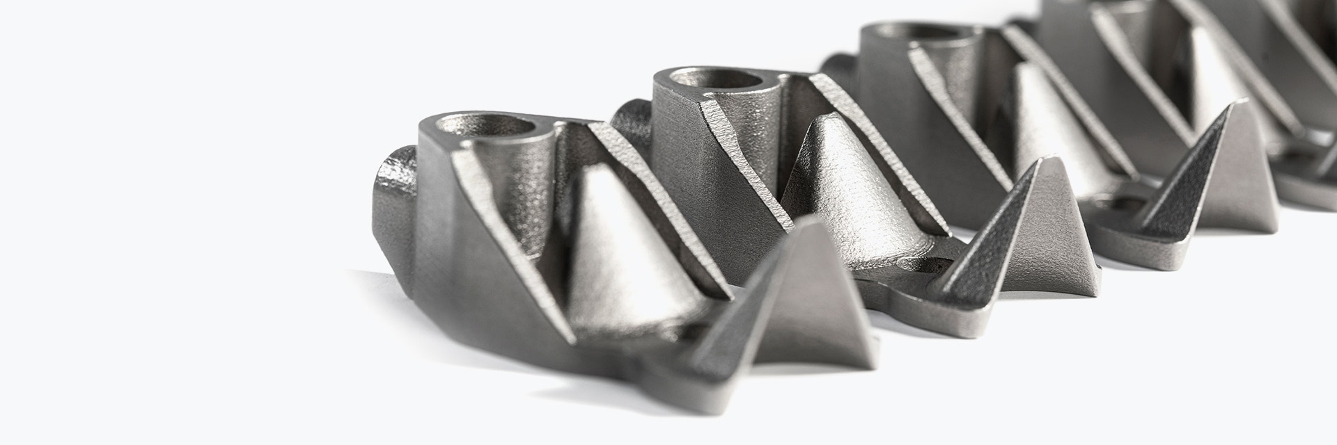 Row of metal 3D-printed parts 