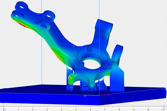 Digital visual of a part with simulation applied. Most of the part is in blue, indicating low risk