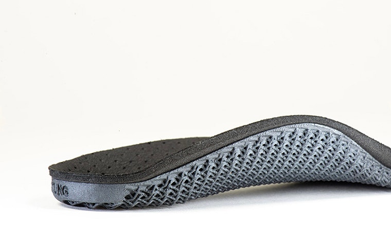 Side view of 3D-printed orthotics with a cloth covering