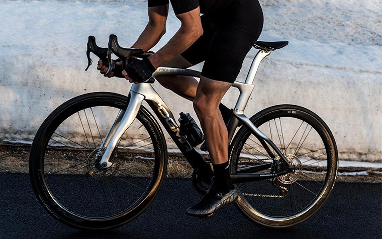 Man riding a bike uphill