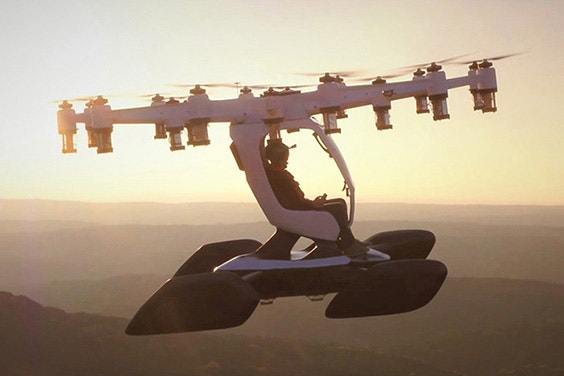 Person flying the LIFT aircraft as the sun sets