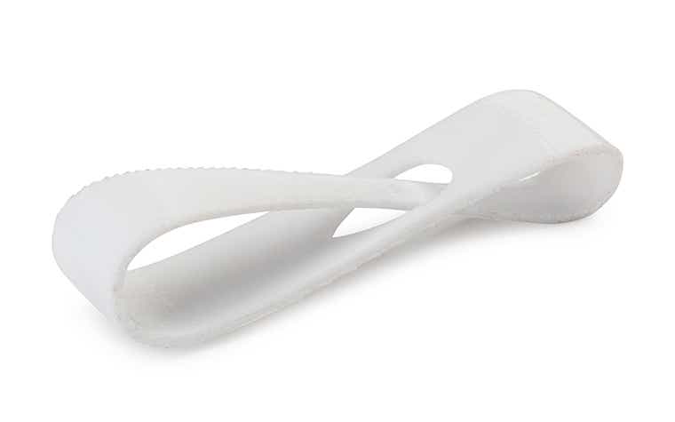 A white 3D-printed loop made from polycarbonate using fused deposition modeling, with a normal finish. 