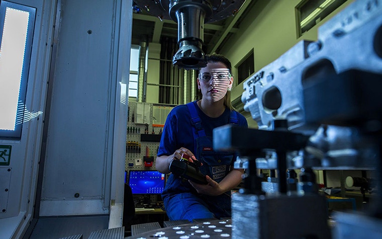 ACTech operator operating a machine 