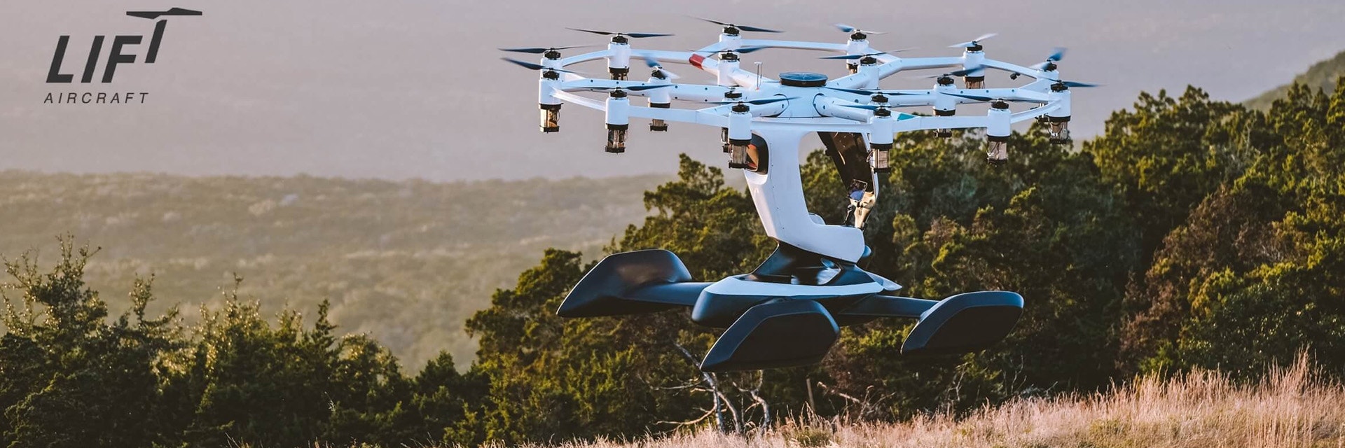 LIFT's HEXA aircraft flying unmanned above a field