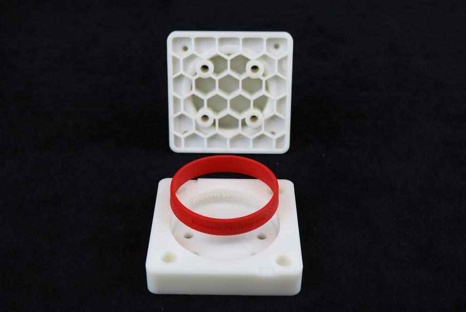 Honeycomb prototype with a red casted part inside