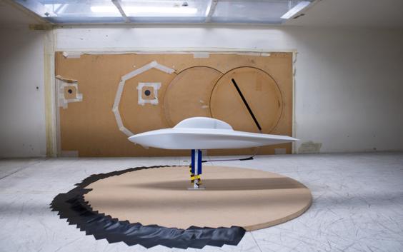 A side-on view of the white 3D-printed replica of the Agoria Solar Car in a wind tunnel. 