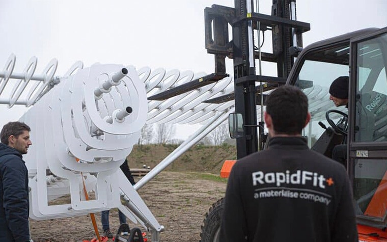 Our team lifting the airplane model