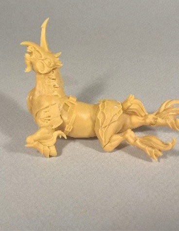 Finished 3D-printed model of a unicorn-like creature