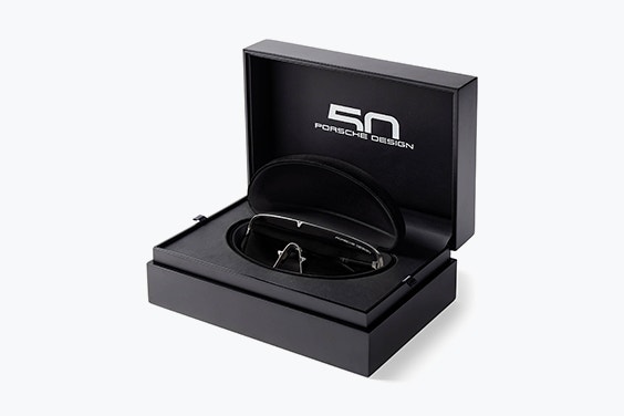 Porsche sunglasses in the product case