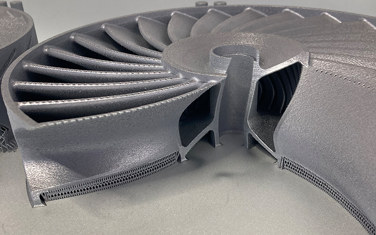 A metal, 3D-printed impeller model with smooth, down-skin zones based on the overhang angles, enabled by support-free printing.