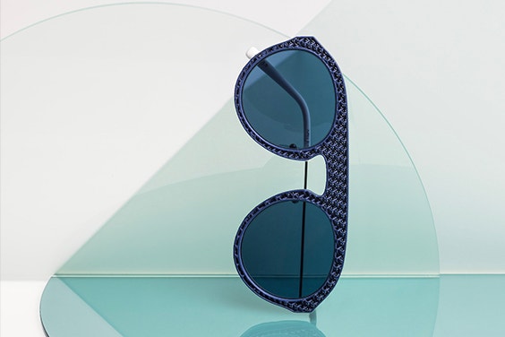 Sunglasses from the Safilo Oxydo eyewear collection on their side