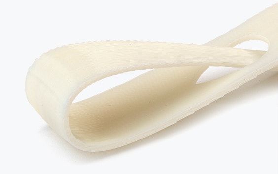 Close-up view of a white 3D-printed loop made from ABS-M30i using fused deposition modeling with a normal finish