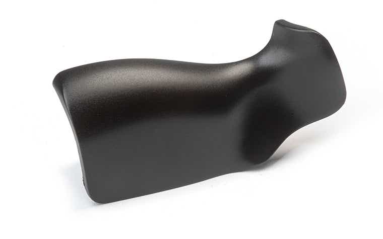 A black handle made with ABS-like Polyurethanes using vacuum casting, finished with primer and matte paint with a 30% gloss.