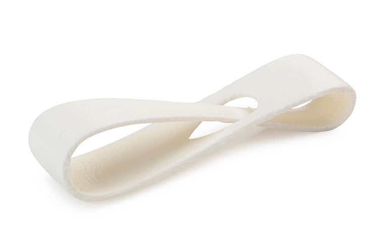 A white 3D-printed loop made from ABS-M30 using fused deposition modeling, treated with sealant. 