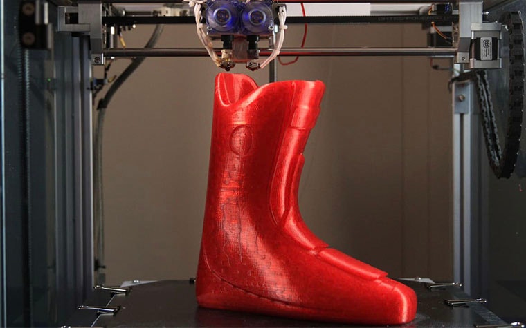 Personalized ski boot being 3D printed in an FDM printer