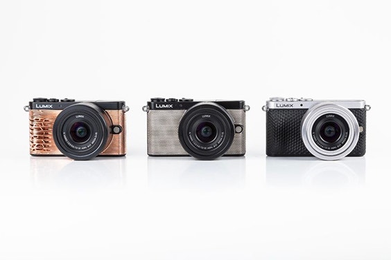 Three Panasonic Lumix cameras against a white background 