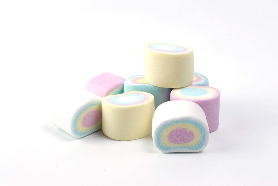 A pile of ciruclar, colorful marshmallows