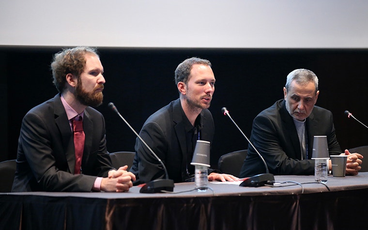 3 men at microphones at the ISTA 2017 conference 