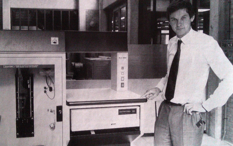 Fried Vancraen stands in front of Materialise’s first stereolithography printer. 