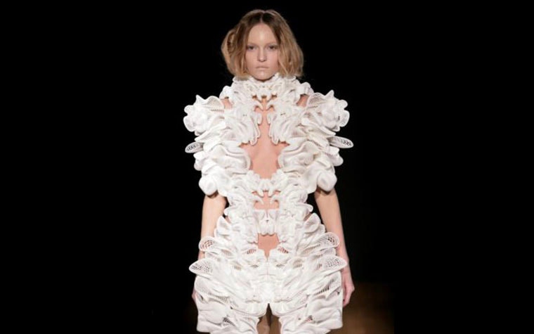 Model on the runway wearing a 3D-printed dress