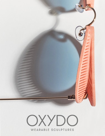 Top view of 3D-printed, salmon-colored eyewear by Oxydo