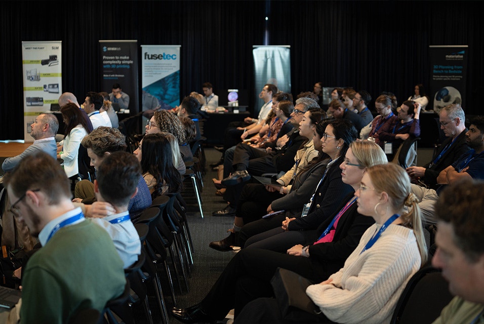Attendees sitting to listen to a presentation during the 3D Printing in Hospitals Forum 2024