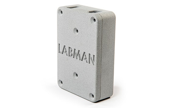 Block 3D printed in PA-AF with "LABMAN" etched into it