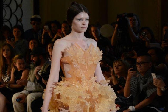Model on the runway wearing a 3D-printed dress