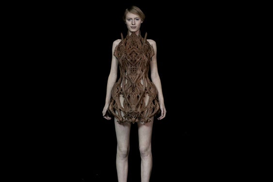 Full-body view of a model wearing a 3D-printed dress