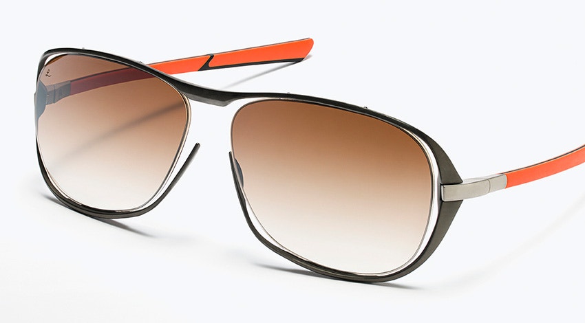 Close-up of red and black McLaren 3D-printed sunglasses from the McLaren Vision Collection