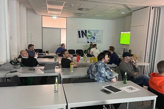 Materialise Germany team watching football on a screen