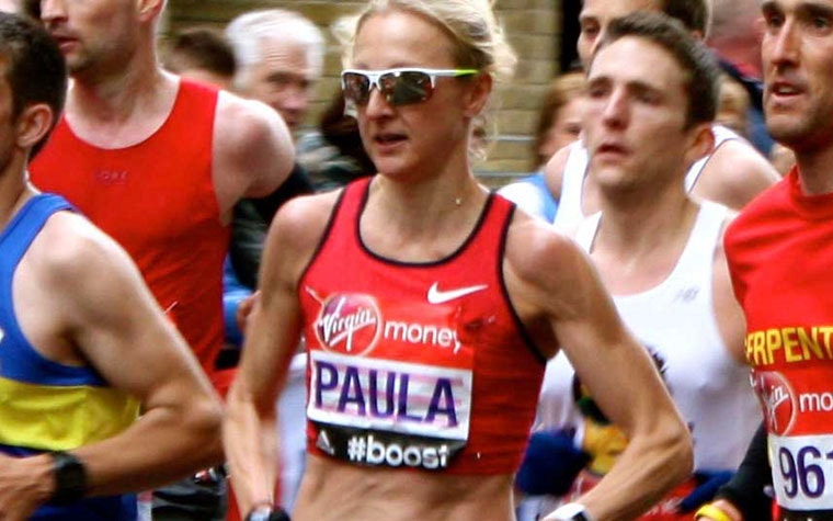 Paula running in a crowd